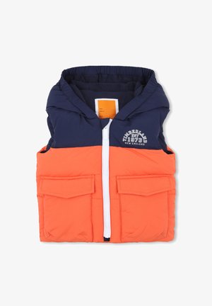 Gilet coloré avec une partie supérieure marine et une partie inférieure orange vif. Il est doté d'une fermeture éclair, de deux poches avant et d'une capuche. Matériau doux et rembourré.