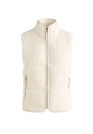 Svetlo krémová sherpa fleecová vesta s vysokým golierom, predným zipsom a zipsami na bočných vreckách, navrhnutá pre teplo a pohodlné nosenie.