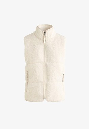 Svetlo krémová sherpa fleecová vesta s vysokým golierom, predným zipsom a zipsami na bočných vreckách, navrhnutá pre teplo a pohodlné nosenie.