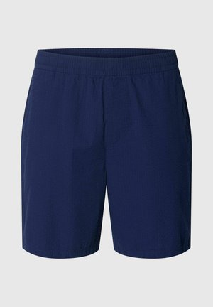Shorts décontractés pour hommes bleu marine avec ceinture élastique, poches avant et tissu léger.