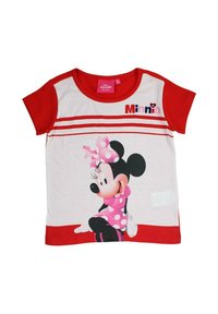 Chemise à manches courtes rouge et blanche avec un graphisme d'un personnage portant une robe rose à pois. Matière en coton avec un col rond.