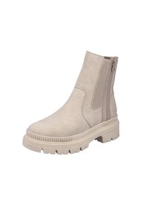 Bottine beige avec semelle épaisse à crampons, fermeture éclair latérale et panneau élastique pour un enfilage facile et un ajustement sûr.