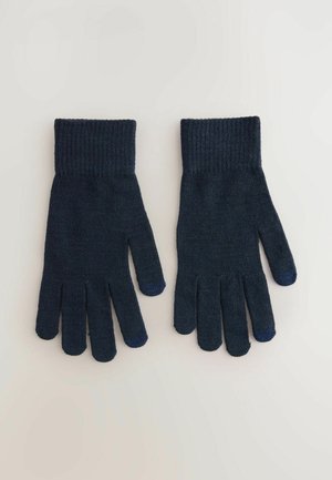 Guanti a maglia blu navy con polsini a costine, dotati di cinque dita e punte texturizzate a contrasto sul pollice e sull'indice.