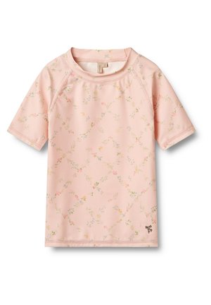 T-shirt à manches courtes en tissu rose clair avec un motif floral. Dispose de manches raglan et d'un petit logo en accent au bas.