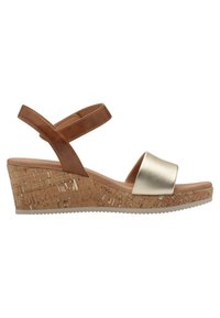 Sandal med kilehæl, der har en brun læder ankelrem, en guldmetal tåbånd og en struktureret korkplatform med en let gummisål.