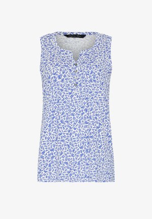 Blouse blanche sans manches avec motif de feuilles bleues, encolure ronde avec une petite fente en V, et quatre boutons à l'avant.