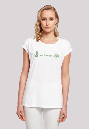 White short-sleeve t-shirt featuring green text "let it snow" with a snowman and snowflake graphic, made from soft cotton fabric.