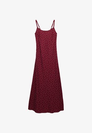 Robe longue rouge sans manches avec fines bretelles doubles et petit motif floral blanc.