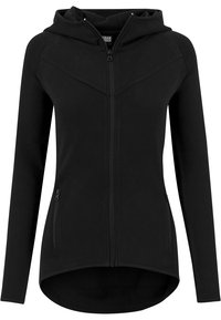 Sweat à capuche zippé noir au design ajusté, avec des manches longues et un ourlet légèrement arrondi. Il dispose de deux poches latérales zippées et d'une capuche doublée.