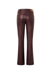 Brown flared jeans with a glossy finish, featuring two back pockets and a leather waistband label for brand identification.