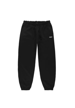 Czarne dresy z wiązanym pasem, zwężanymi nogawkami i elastycznymi mankietami. Posiadają małe białe logo na lewym udzie.