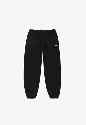 Czarne dresy z wiązanym pasem, zwężanymi nogawkami i elastycznymi mankietami. Posiadają małe białe logo na lewym udzie.