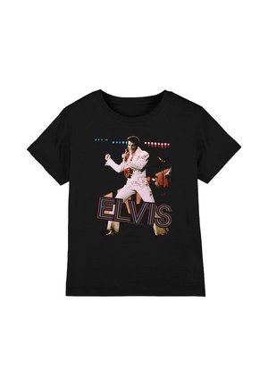 Schwarzes T-Shirt mit einem Farbfoto von Elvis Presley, der in einem weißen Overall auftritt; darunter steht "ELVIS" in großen Retro-Buchstaben.