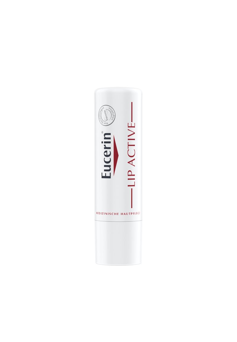 Eucerin Lip Active Lippenbalsam in einer zylindrischen weißen Tube mit rotem Text. Verfügt über ein Drehmechanismus-Anwendungsdesign und eine medizinische Hautpflegekennzeichnung.
