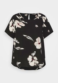 Svart kortärmad blus med rund halsringning, prydd med stora vita blommönster och röda accenter, slät tyget och en böjd fåll.