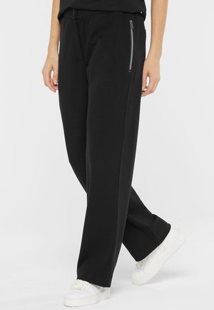 STILVOLLE STRUKTUR - Trousers - black