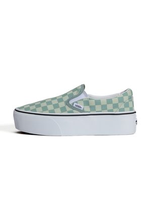 Tenisówka wsuwana z zielono-kremowym wzorem w kratę, białą gumową platformą i metką z logo Vans z boku.