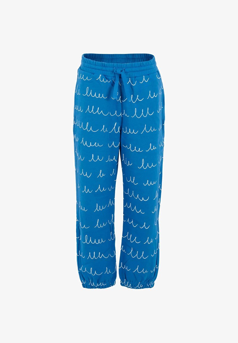 Pantalons bleus à taille élastique avec des motifs abstraits en zigzag blancs, cordon de serrage, poches latérales et poignets élastiques aux chevilles.