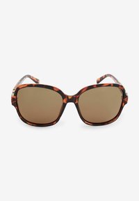 Gafas de sol carey con lentes cuadrados grandes, lentes de color marrón y detalles en contraste en las patillas. Acabado suave.