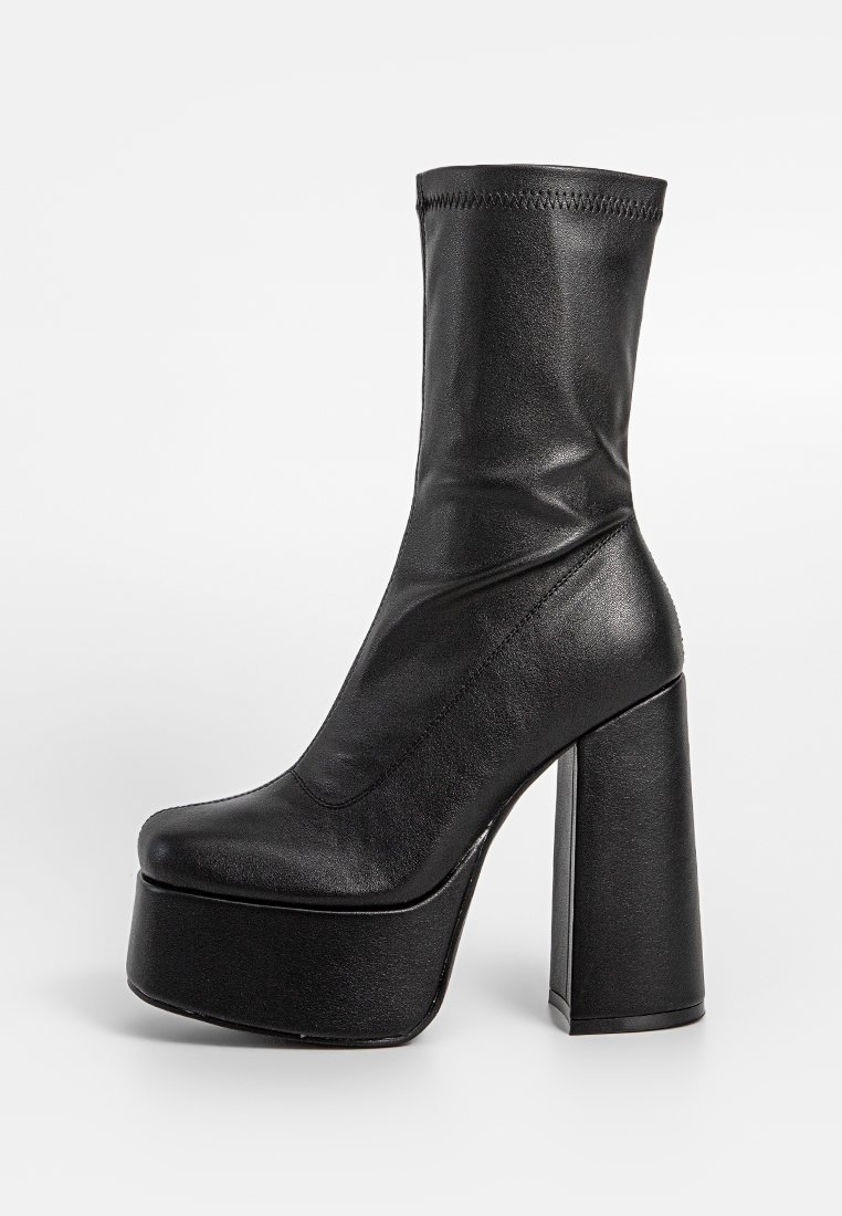 Koi Footwear Enkellaarsjes met plateauzool zwart Koi Footwear Enkellaarsjes met plateauzool zwart