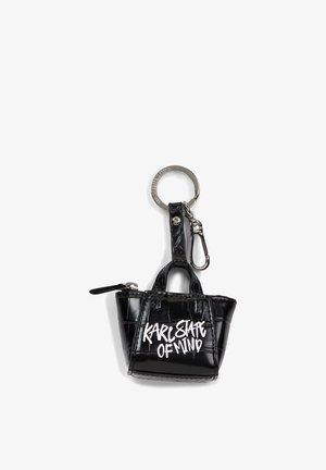 Schwarzer Mini-Tote-Schlüsselanhänger aus Kunstleder mit weißem „KARL STATE OF MIND“ Schriftzug, silbernem Reißverschluss und Metallring mit Clip-Befestigung.
