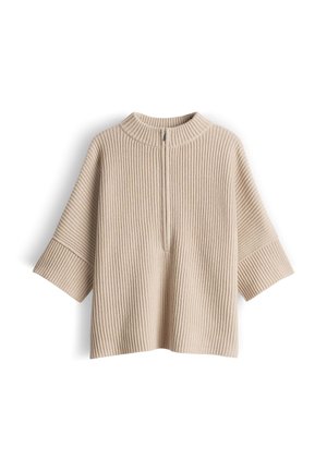 Beige gebreide trui met geribbelde textuur, halve ritssluiting aan de voorkant en korte, brede mouwen. Heeft een hoge hals en een losse, ontspannen pasvorm.
