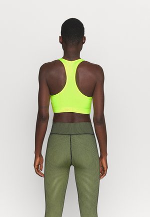 PRESELLE - Medium support sports bra - neon yellow