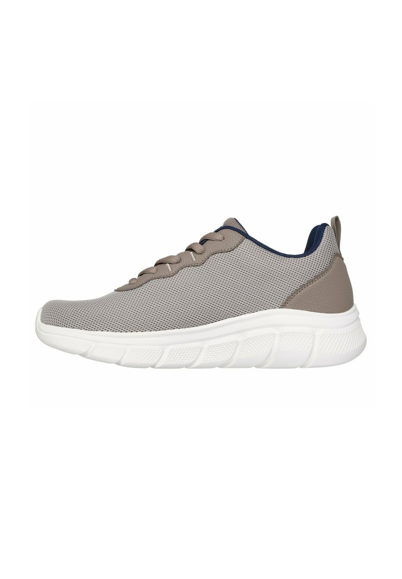 Gray mesh athletic shoe with white rubber sole, rounded toe, lace-up front, and contrasting navy accents on the collar.