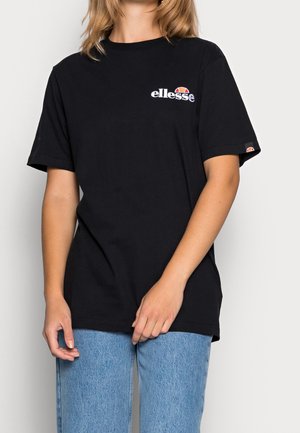 Zwart katoenen T-shirt met korte mouwen. Heeft een wit "ellesse" logo op de borst en een kleurrijk accent op de mouw.