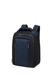 Zaino blu navy e nero, realizzato in materiale sintetico, dotato di molteplici scomparti, spallacci imbottiti e una maniglia superiore per il trasporto.