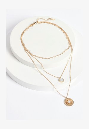 Next Ogrlica - gold tone