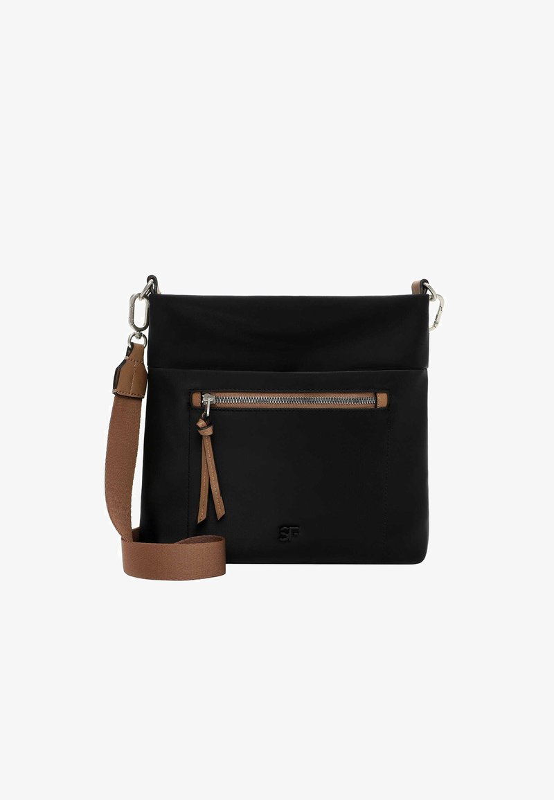 Black crossbody bag with front zip pocket, brown adjustable shoulder strap, and silver hardware details.