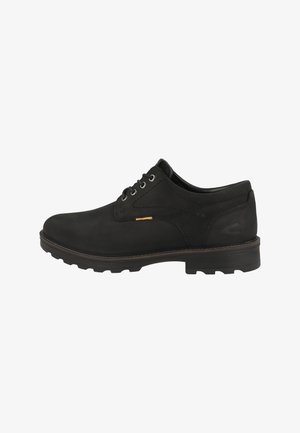 Black leather shoes with a smooth finish, featuring round toe, lace-up design, metal eyelets, and a textured rubber outsole.