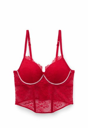 Czerwony koronkowy biustonosz z fiszbinami, szczegółowym wzorem koronki, regulowanymi ramiączkami i ozdobnym obszyciem z cyrkonii wzdłuż dekoltu.