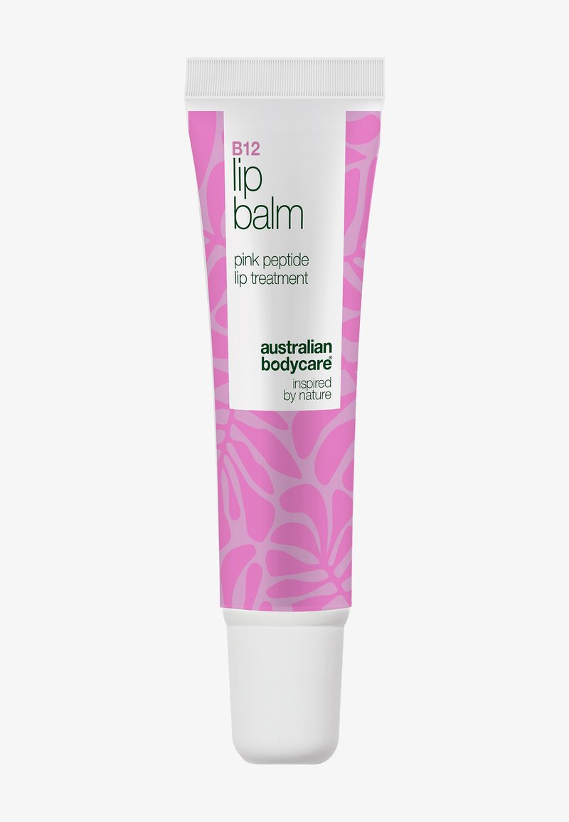 Tube de baume à lèvres au peptide B12 rose Australian Bodycare avec un capuchon blanc et un motif floral rose sur l'emballage.