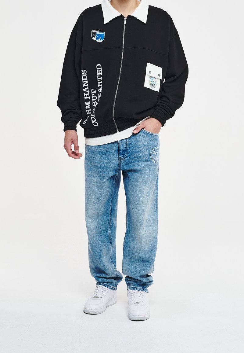 Pegador Felpa con zip - black