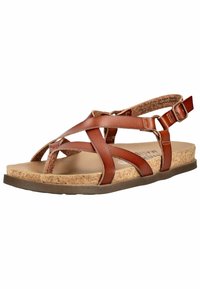 Hnědá kožená sandála s pásky, korkovou stélkou, nastavitelným přezkovým páskem kolem kotníku a plochou gumovou podrážkou, určená pro běžné nošení.