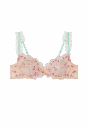 Reggiseno in pizzo trasparente pesca con ricami floreali rosa, bordi ondulati, spalline verde menta e dettagli decorativi al centro.