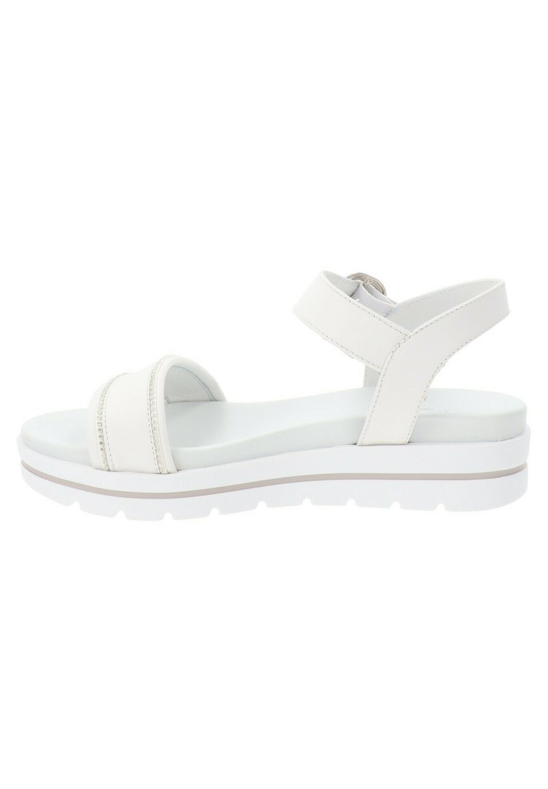 White sandal with two wide straps and a back strap. Thick white sole with subtle grey accent. Smooth, synthetic material and sleek design.