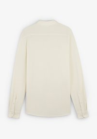 Long-sleeve shirt in cream fabric, featuring a straight cut, buttoned cuffs, and a high collar. Smooth texture with minimalist design.