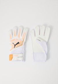 Weiße Torwarthandschuhe mit orangen Akzenten, strukturierten Grip-Pads und atmungsaktivem Mesh-Material. Inklusive verstellbarer Handgelenkschnallen.