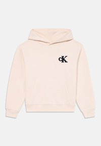 Felpa leggera color beige chiaro realizzata in tessuto morbido, con tasca frontale e logo "cK" ricamato in blu scuro sul petto. Cappuccio regolabile.