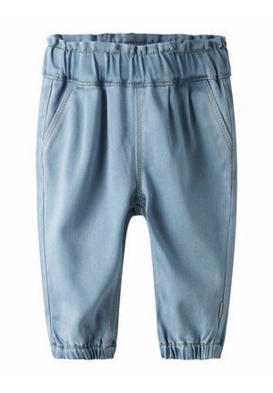 Siaurėjantys džinsai - light blue denim