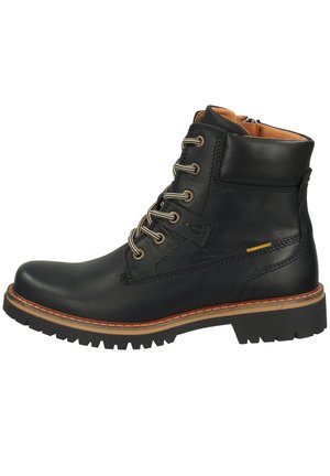 Black leather ankle boot with round toe, metal eyelets, contrasting tan stitching, and textured sole for grip. Features a side zip closure.