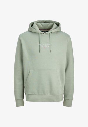 Hele roheline kapuutsiga dressipluus pehmest kangast, millel on esitasku, reguleeritav nööriga kapuuts ja rindkere peal trükitud logo.