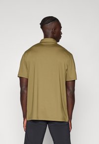 Peak Performance POCKET - Polo - snap green