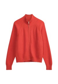 Geribbelde zip-up trui in levendig oranje, met een hoge kraag en lange mouwen, gemaakt van een textuur gebreid materiaal.