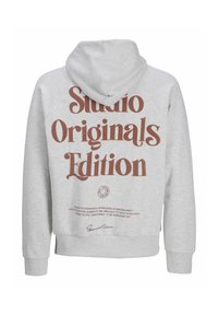 Sweat à capuche gris avec une grande impression marron au dos portant la mention "Édition Originals Studio". Comprend une capuche et des poignets côtelés.