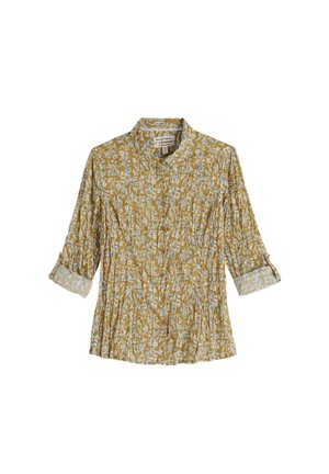 Mosterdgele blouse met wit en lichtblauw bloemenprint, 3/4 korte mouwen, geplooide voorkant en een knoopsluiting bij de kraag.