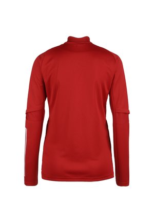 Red long-sleeve sports jersey featuring a high collar, textured shoulder panels, and white accent stripes on the sleeves. Smooth fabric finish.